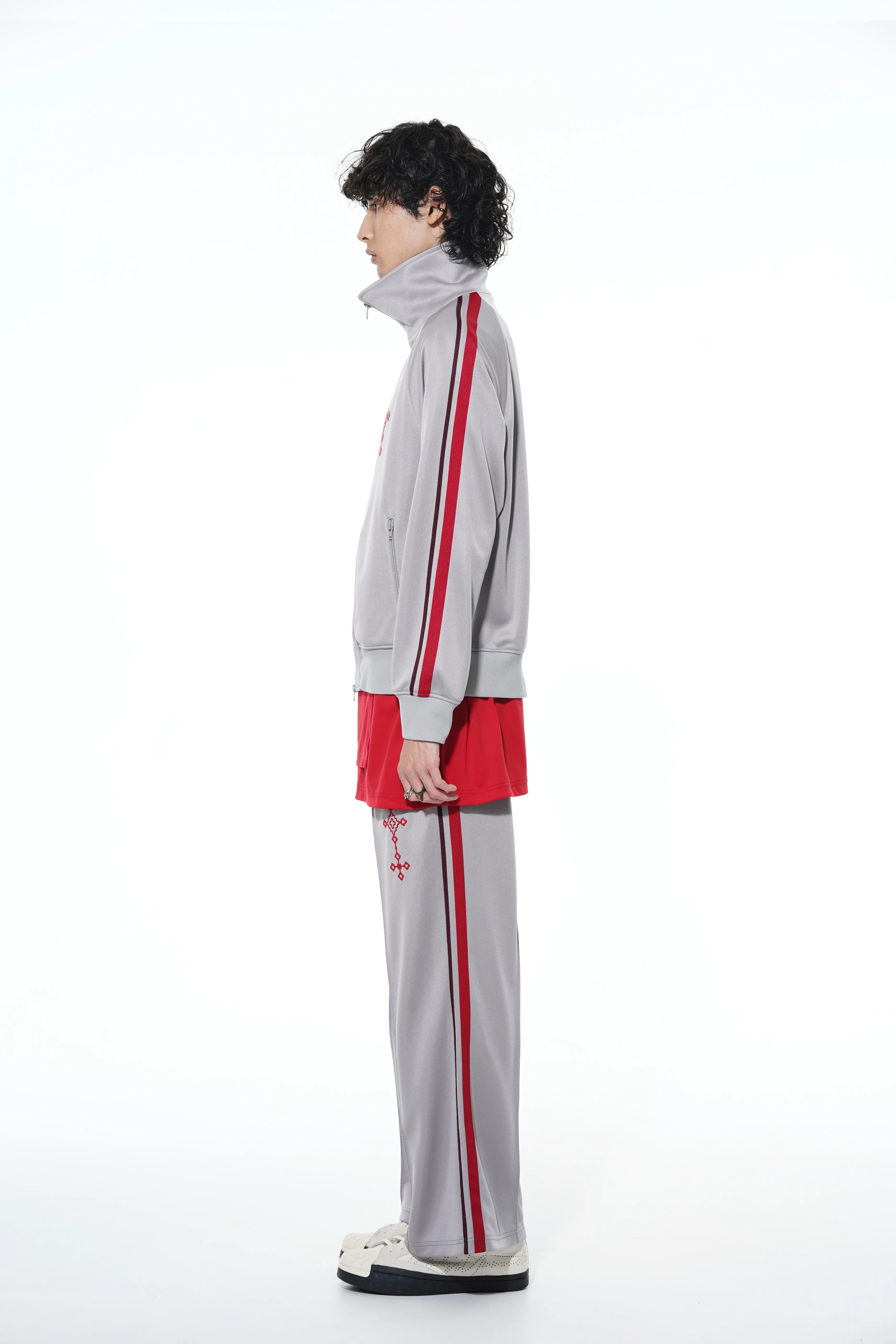 PE/SMOOTH JERSEY GEOMETRIC PATTERN EMBROIDERY SIDE TAPE LINE FLARE PANTS